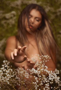 Jazmyne Surrounded by Flowers