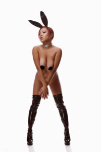Nude Model in Thigh High Boots